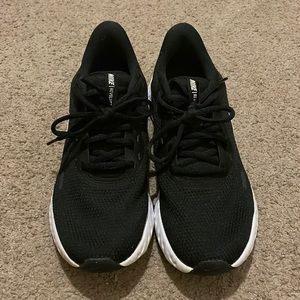 Women’s Black and White Nike Revolution Running Shoes Size 7.5